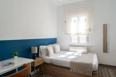 Bedroom; natural light, wood floor
