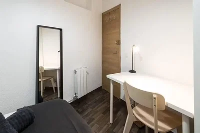 Bedroom; wood floor, natural light