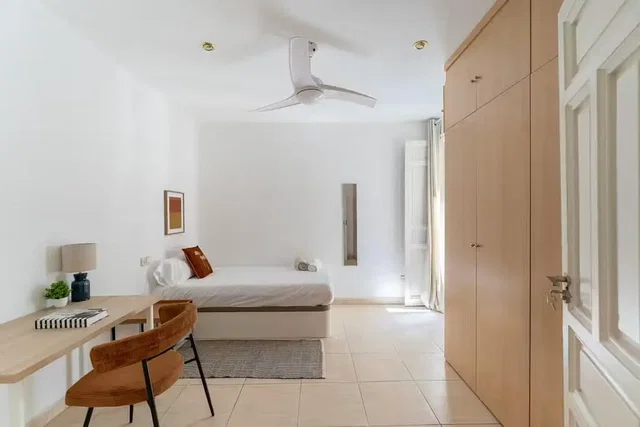Bedroom; natural light, wood floor