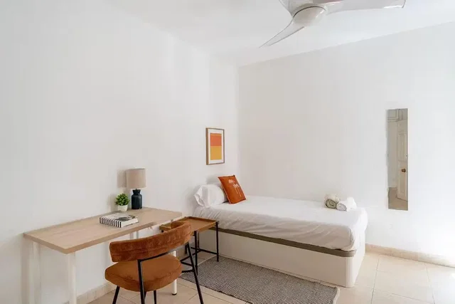Bedroom; natural light, tile floor