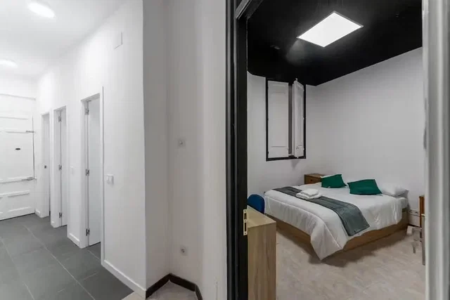 Bedroom; natural light, tile floor, wood floor