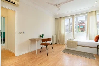 Bedroom; wood floor, natural light