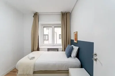 Slaapkamer; natuurlijk licht, houten vloer
