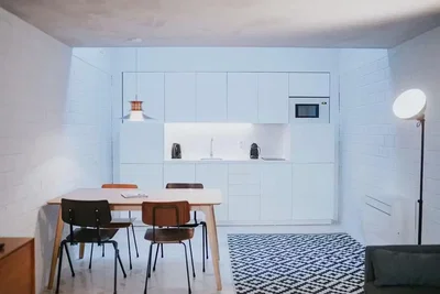Kitchen; kitchen appliances, tile floor, natural light
