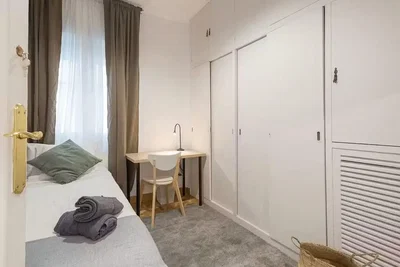Bedroom; natural light, wood floor