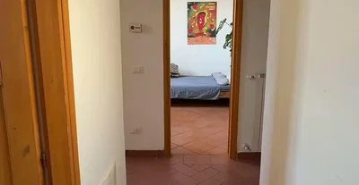 Bedroom; tile floor, natural light