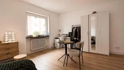 Bedroom; wood floor, natural light