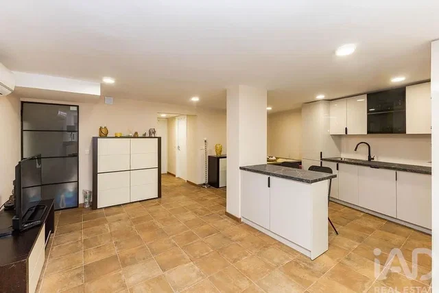 Kitchen; tile floor, kitchen appliances, natural light