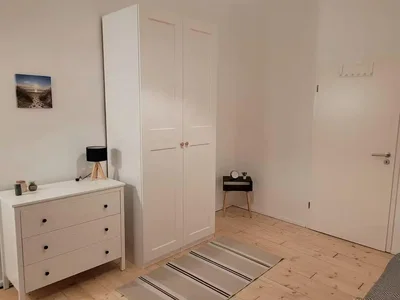 Bedroom; wood floor, natural light