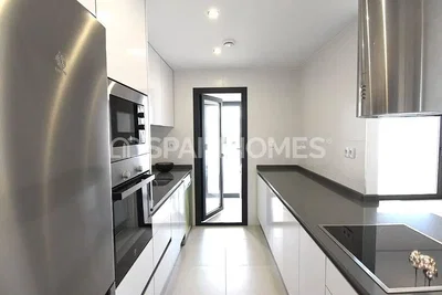 Kitchen; kitchen appliances, tile floor, natural light, modern style