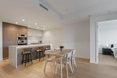 Kitchen; kitchen appliances, wood floor, natural light, renovated