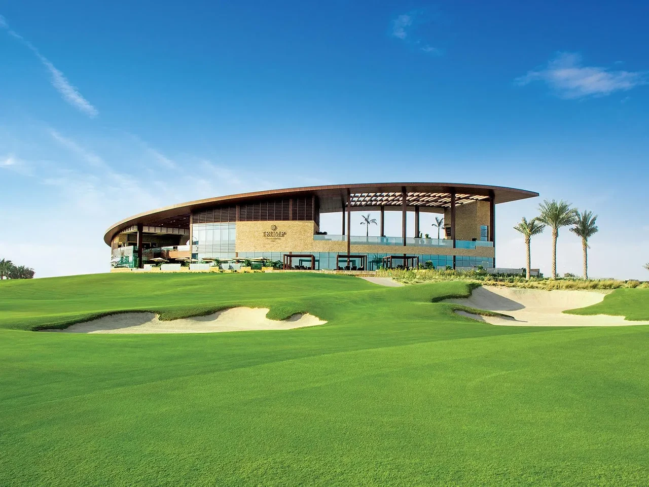 TRUMP INTERNATIONAL GOLD CLUB: Complementing the magnificent golf course, the 30.000 sq.ft luxury clubhouse offers an infinity pool, upscale dining, and state-of-the-art facilities.